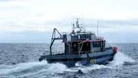 Konttilaiva myynnissä