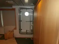Konttilaiva myynnissä