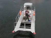 Konttilaiva myynnissä