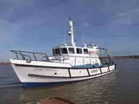 Konttilaiva myynnissä