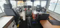 Konttilaiva myynnissä