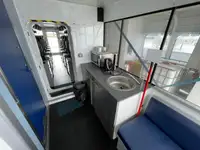 Konttilaiva myynnissä