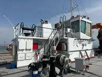 Konttilaiva myynnissä