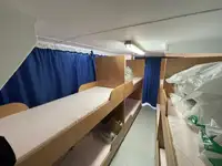 Konttilaiva myynnissä